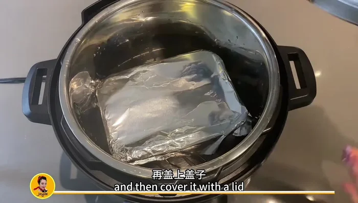 Steam in the pressure cooker (1 inch water in the bottom, pan on a steaming rack, covered with tin foil) on high for 5 minutes. Quick release. Repeat steps 5 & 6 three more times for four layers. [198.56]