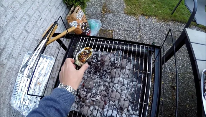 Grill the oysters until caramelized.