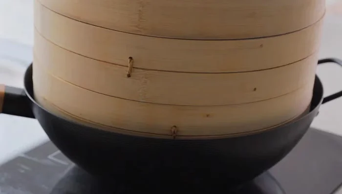 Steam for 13 minutes. Turn off the heat, and let stand for 5 minutes before opening the lid.