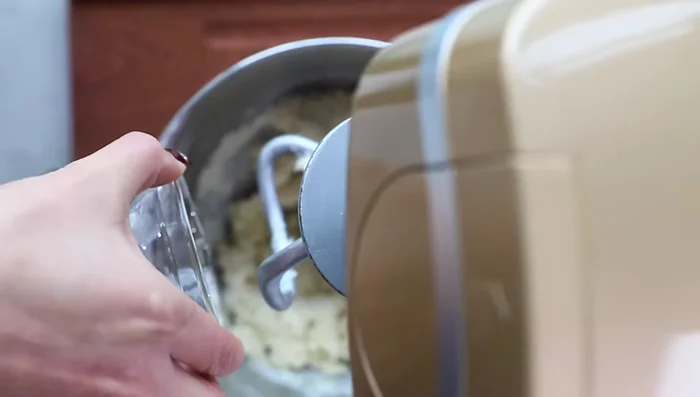 Add vegetable oil (or n). Continue kneading for at least 10 minutes until the dough is smooth and elastic.