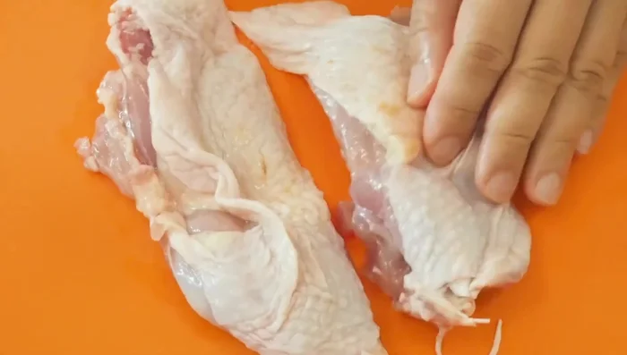 Cut the chicken into bite-sized pieces. Remove the skin and any visible fat if preferred.