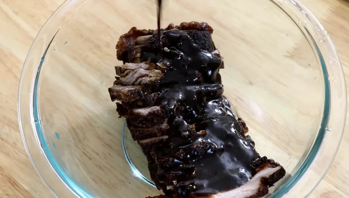 Slice the pork into 1/4-inch thick pieces. Combine the pork with the sauce, ensuring seasoning gets between each piece.