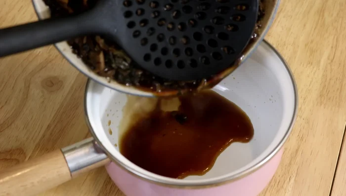 Remove from steamer, discard excess liquid, and thicken the remaining liquid with cornstarch water to create a light gravy.
