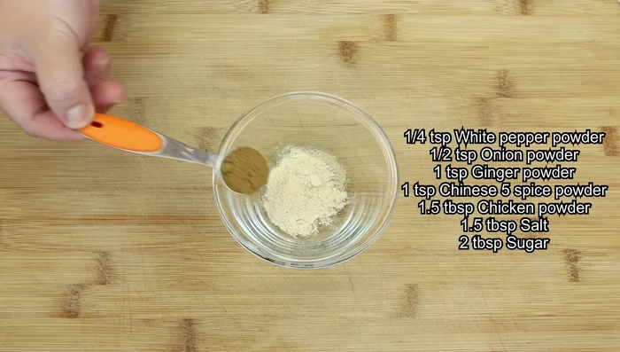 Mix white pepper powder, onion powder, ginger powder, Chinese five spice powder, chicken powder, salt, and sugar. Stir well and set aside.