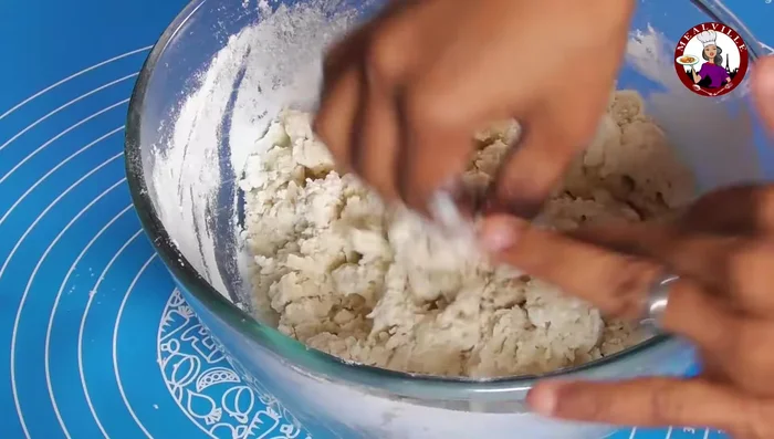 Knead the dough for 5-8 minutes until smooth. Transfer to a work surface to continue kneading.