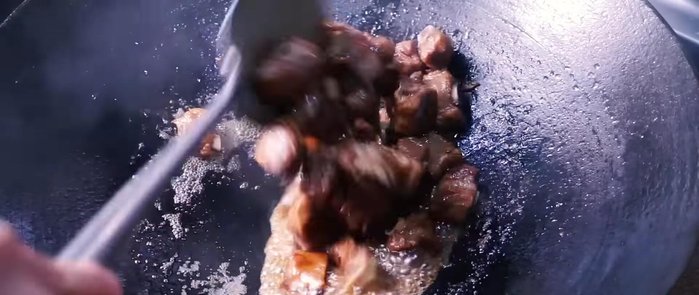 Increase the heat to high and thicken the sauce, stirring constantly to prevent burning. Add dark soy sauce and stir for 1-2 minutes.