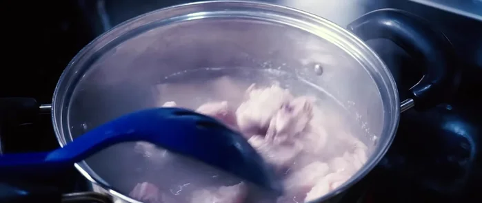 Blanch the pork ribs in boiling water for 3-4 minutes. Drain and set aside. (Note: Most grocery stores don't cut pork ribs across the bones like the ones shown in the video. Asian markets often sell pre-cut ribs.)