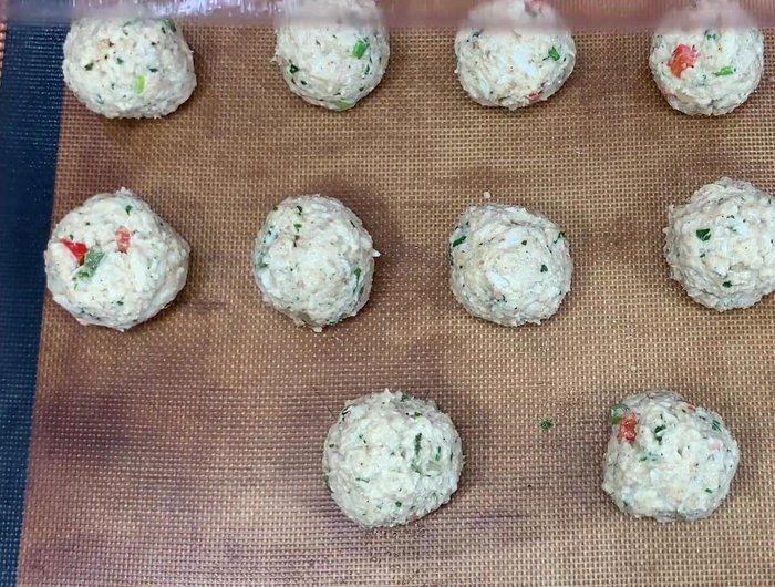Cover the crab balls in plastic wrap and refrigerate for 30 minutes.