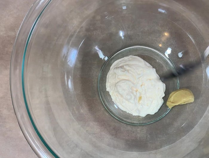 In a large bowl, combine mayonnaise, Dijon mustard, lemon juice, Worcestershire sauce, Old Bay hot sauce, pepper, onion powder, garlic powder, Creole seasoning, Old Bay seasoning, parsley, and 1 beaten egg. Mix well.