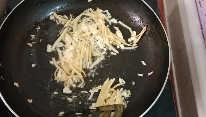 Garnish with chopped green onions before serving. (Timings are not specified in the transcript)