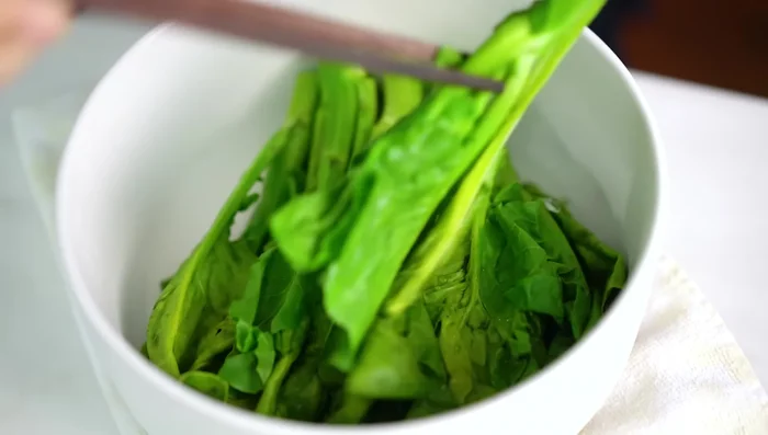 Serve: Serve the glossy, sticky chicken with the steamed Chinese broccoli.
