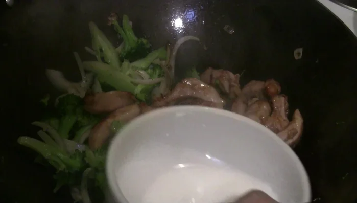 Thicken the sauce: Gradually add the cornstarch slurry to thicken the sauce to your desired consistency.