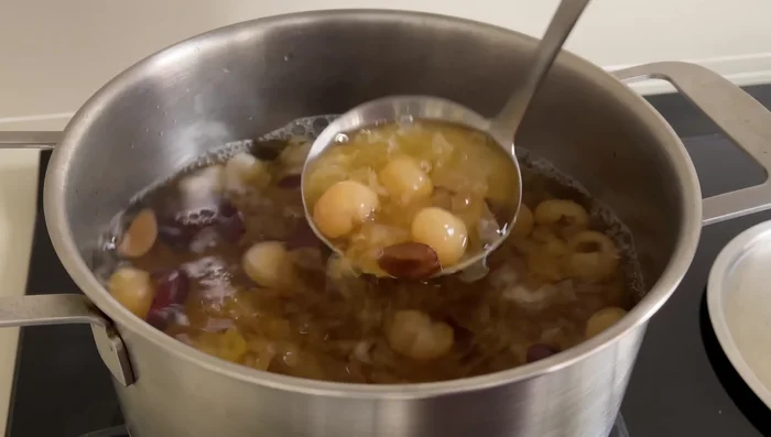Turn off the heat and add sugar. Stir until dissolved.