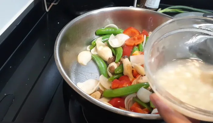 Add the spice mixture and stir until the flour and cornstarch thicken.