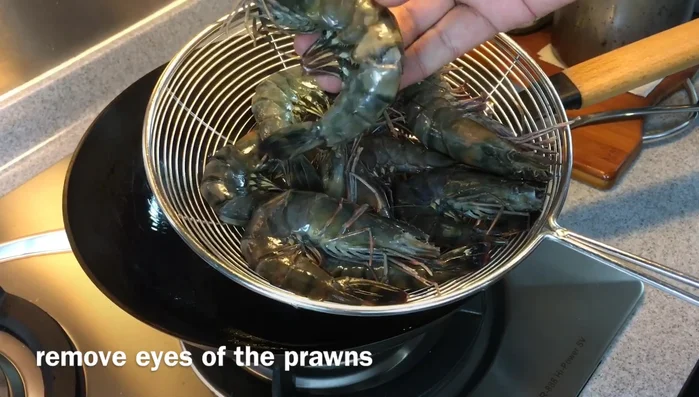 Shallow fry prawns in batches until golden brown, about 10 seconds per side.
