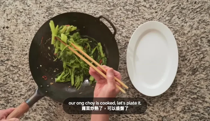 Turn off the heat, mix in a teaspoon of oil, and serve.