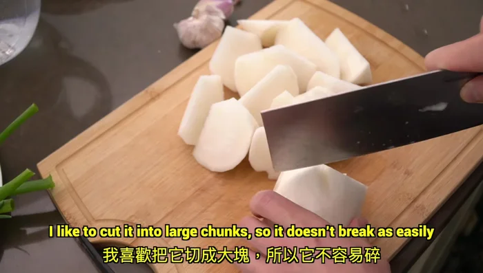 Prepare vegetables: cut radish into large chunks, mince ginger, shallots, green onions, and peel garlic.