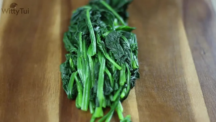 Chop the spinach into 10cm pieces and place in a mixing bowl.