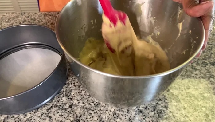 Pour batter into a greased and floured 8-inch cake pan.