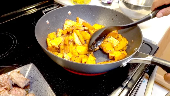 Add water or chicken broth to cover the pumpkin and beef. Cover the pan and cook until the pumpkin is tender.