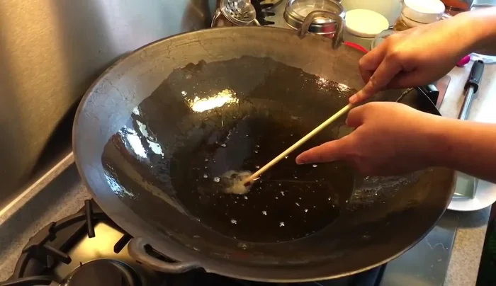 Deep-fry the tofu until golden brown, ensuring the oil is hot enough.