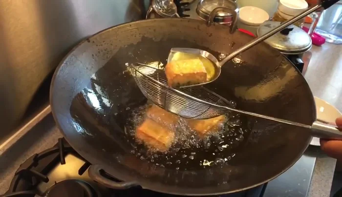 Blanch spinach in boiling salted water.