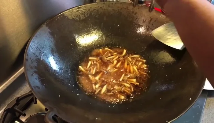 Drizzle sesame seed oil and soy sauce over the dish before serving.