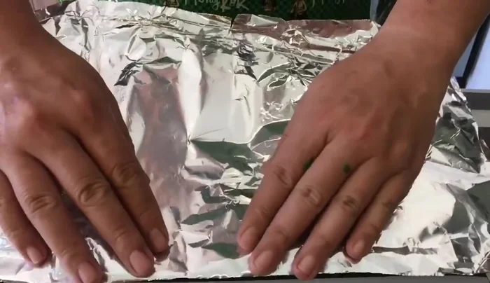 Cover the tray with aluminum foil and steam for approximately 30 minutes (or longer, until cooked through).