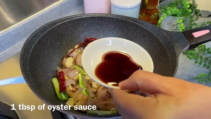 Add oyster sauce, dark soy sauce, soy sauce, and sugar. Mix well.