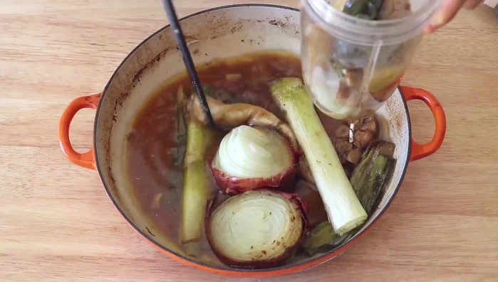 Transfer the pan contents to a juicer or food processor to make the gravy.
