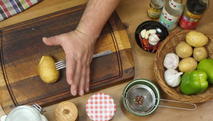 Stack potato slices, insert a toothpick to hold them together, and slice again for extra thin shreds.
