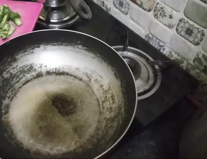 Heat wok and add oil.