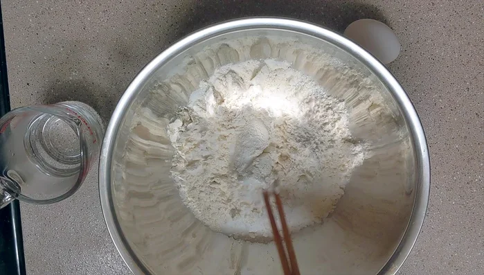 Mix flour, salt, sugar, and baking soda.