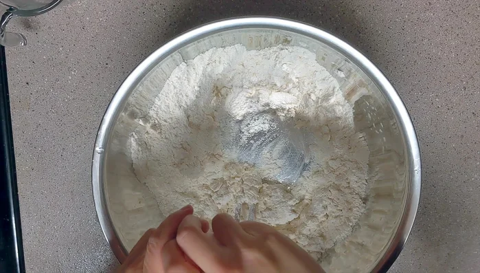 Add one egg and mix everything together.