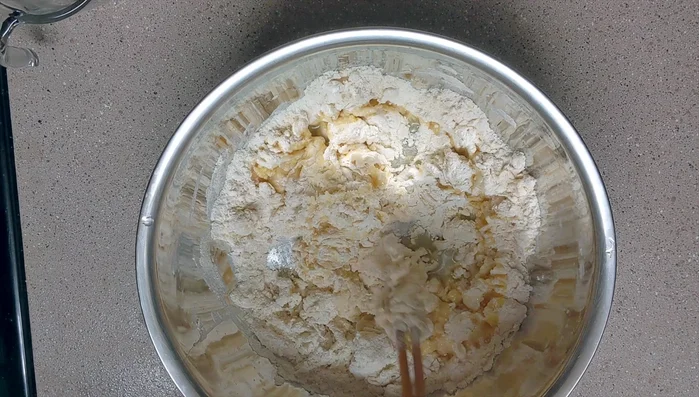 Add 2 tablespoons of oil and mix well. The dough should be soft and moist.