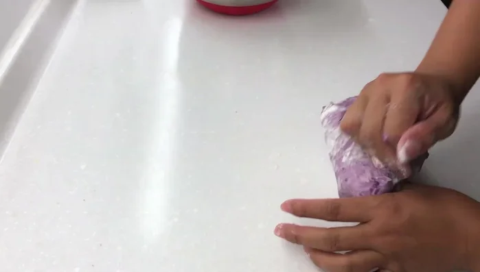 Transfer the dough to a clean surface and gently knead for about 3 minutes. (124.799)