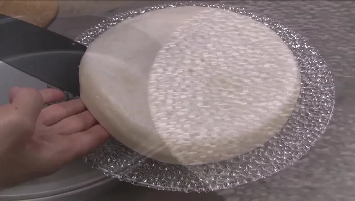 Loosen the cake from the sides of the pan and transfer to a plate to serve.