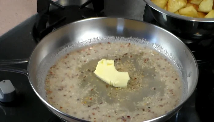 Add butter and stir until melted. Reduce liquid.