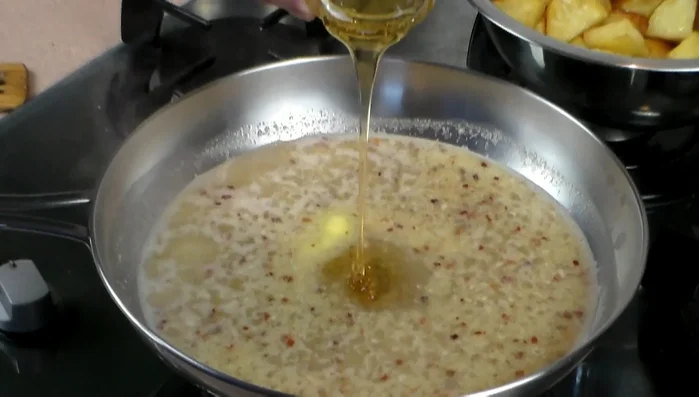Add honey and stir until sauce thickens and bubbles.