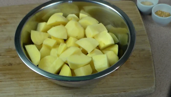 In a bowl, toss potatoes with salt and olive oil.