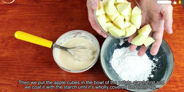 Coat the apple pieces in potato starch, ensuring they are completely dry. This helps them crisp up during frying.
