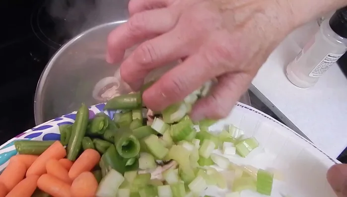 Boil the vegetables (sour, carrot, snap peas, and mushrooms).