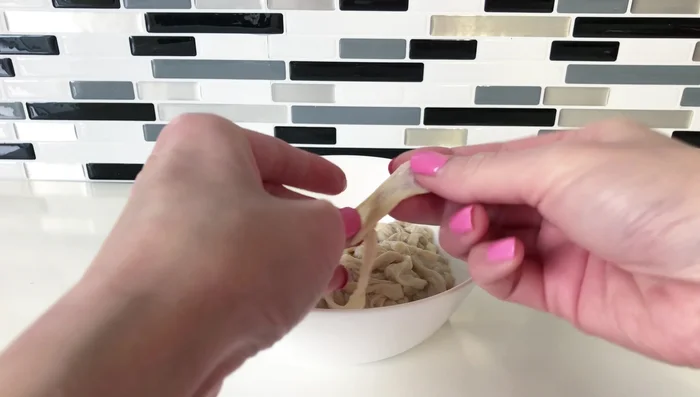Stuff sausages: Using a sausage stuffer or alternative methods (soup spoon, funnel, plastic bottle), fill casings with the marinated pork mixture. Leave about 3-6 inches untied at each end to release air.