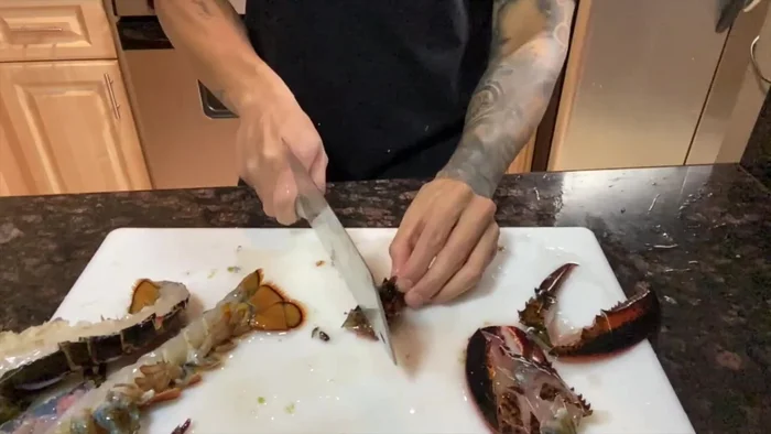 Break open the lobster claws.