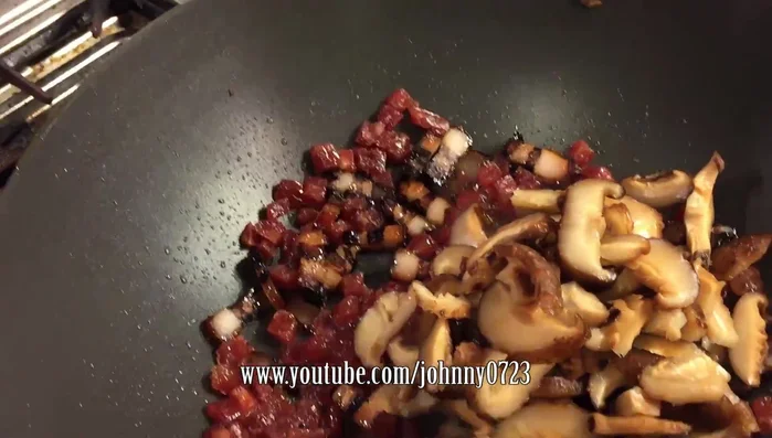 Add the mushrooms and dried shrimp.