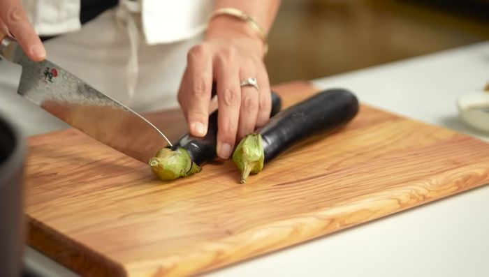 Sear the eggplant in hot olive oil until nicely browned. Set aside.