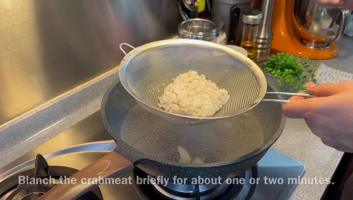Blend frozen crab meat to remove refrigerator taste. Rinse thoroughly.