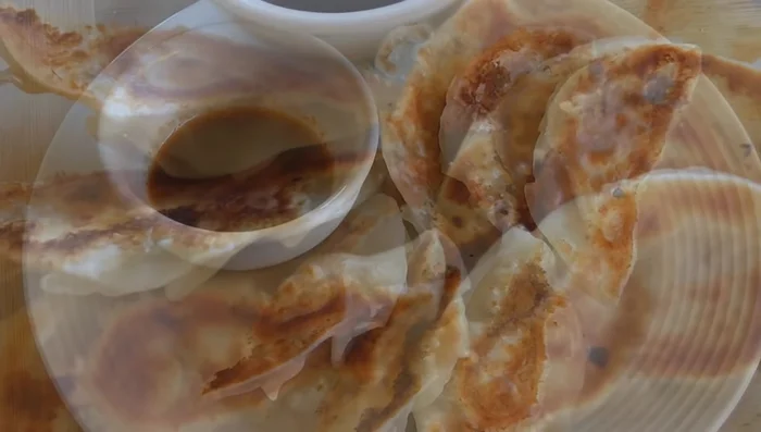 Serve with soy sauce, a little vinegar, and sriracha or chili sauce (optional).