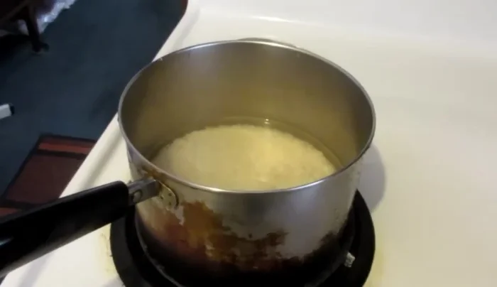 Bring the pot to a medium heat. Cover and do not lift the lid until almost done.