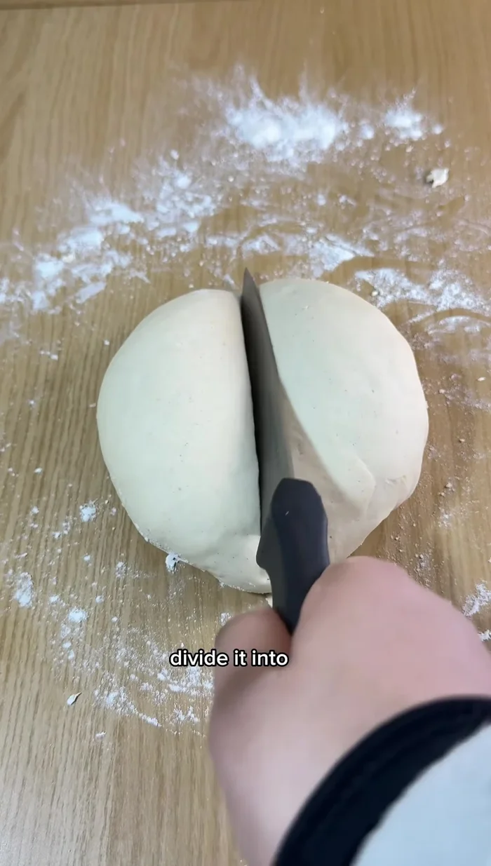 Divide dough into portions, roll out, and cut into circles using a cookie cutter.